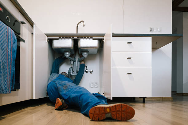 Professional Drain Cleaning technician working in Wheaton, IL